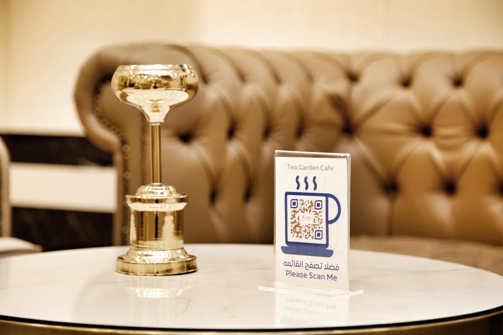 Hotel Maden Alrawda Medina Exterior foto QR code in a coffee shop