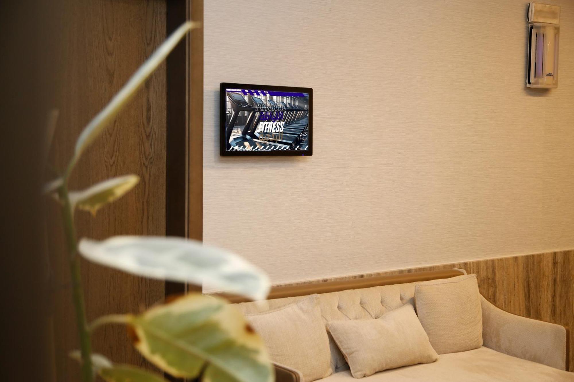 Hotel Maden Alrawda Medina Exterior foto A wall-mounted tablet